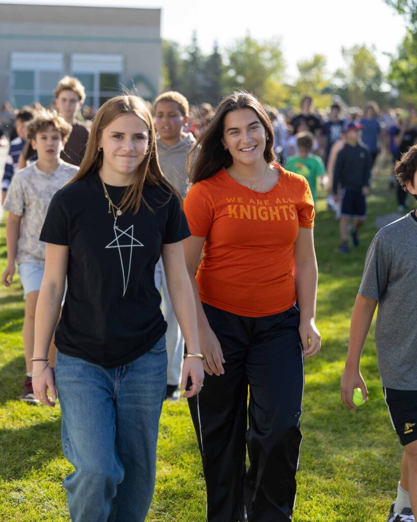 Two Calgary Academy students walk together during the 2025 Terry Fox Run